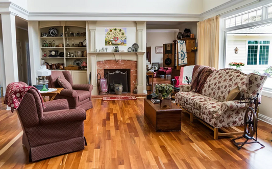 Cozy Living Room showing family tree over the fireplace
